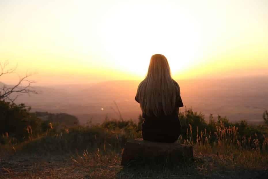 Person looking at sunset